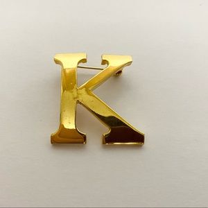 Anne Klein “K” brooch